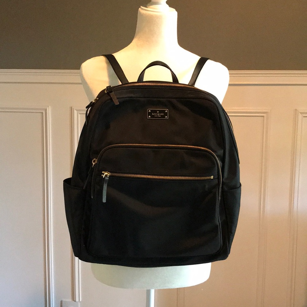 Kate Spade Black backpack with laptop sleeve.